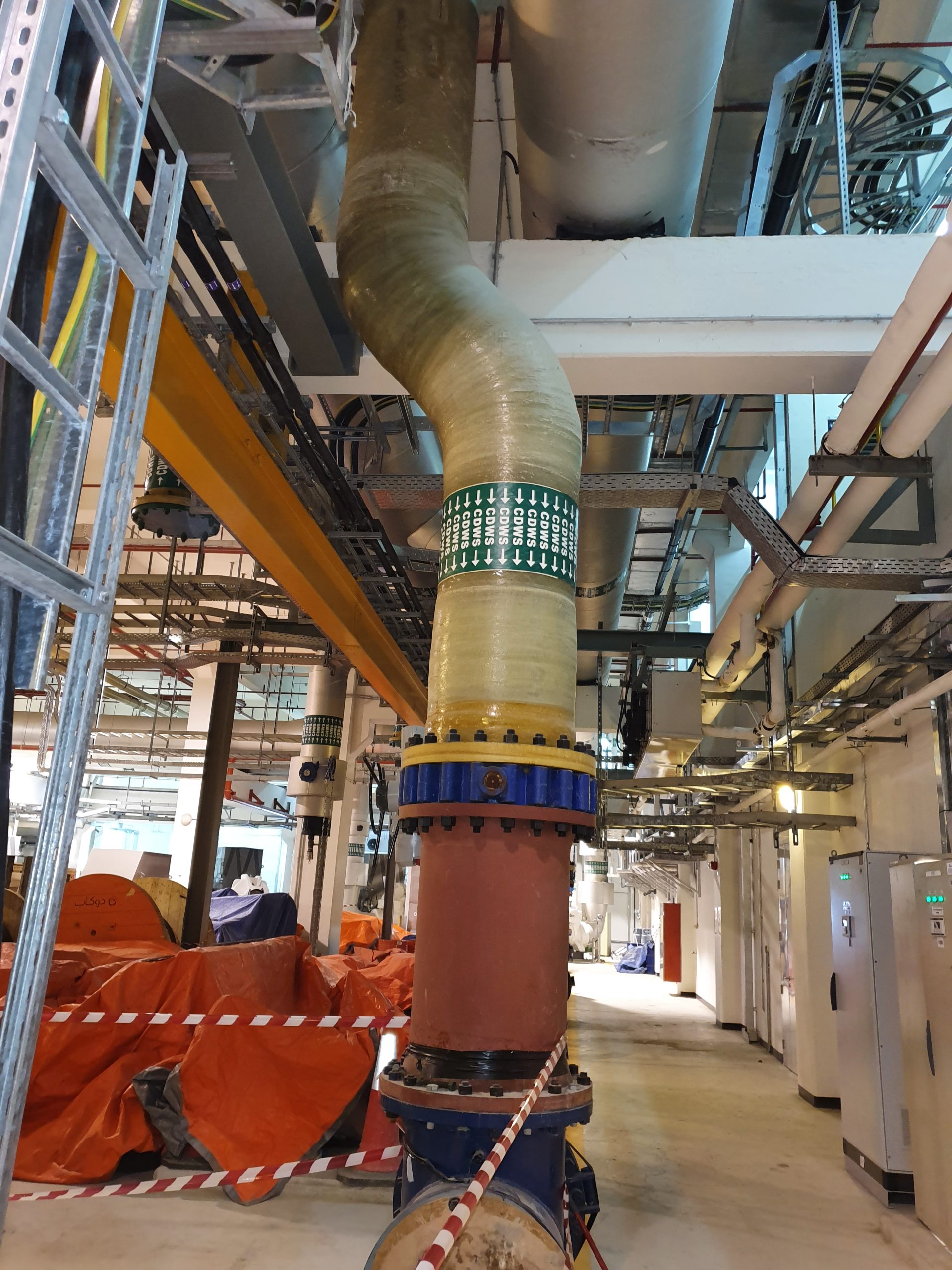 Large diameter chilled water pipeline installation for district cooling plant expansion in Abu Dhabi
