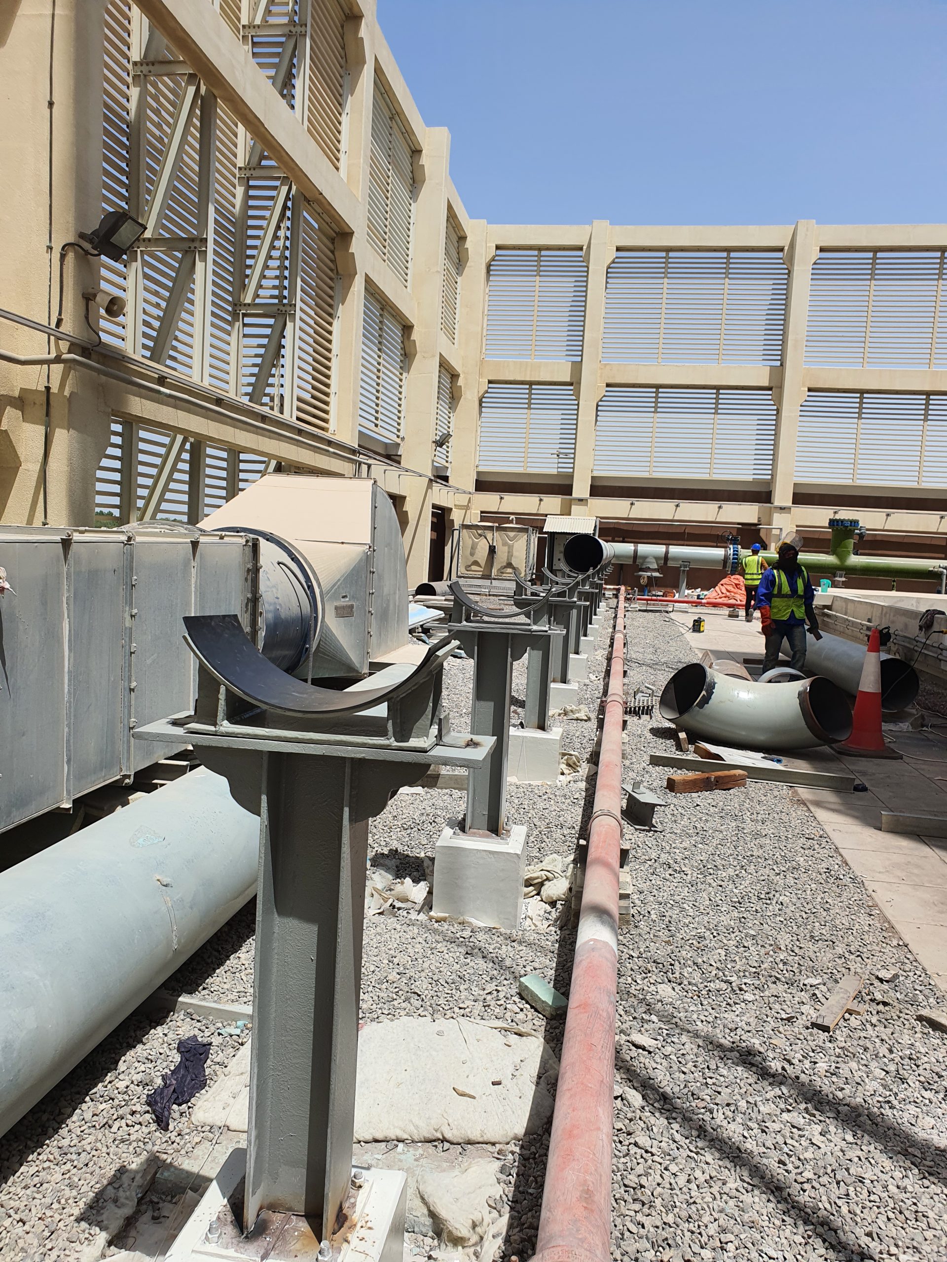 Large diameter chilled water pipeline and structural support installation at DCP ADNEC Abu Dhabi